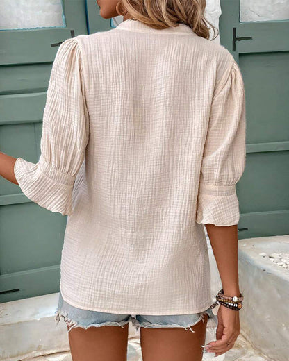 Camicetta con scollo a V e maniche a balze