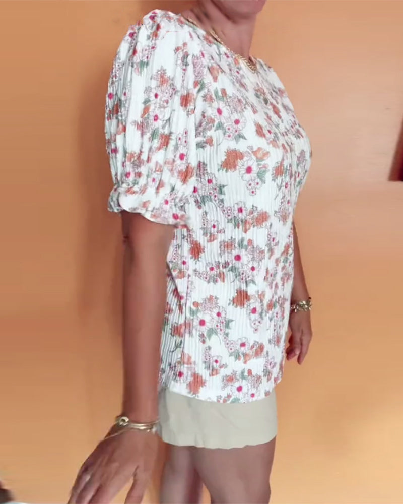 Bluse mit Rundhalsausschnitt und Blumenmuster, kurzärmlig