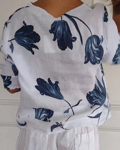 Top con bottoni in cotone e lino con stampa floreale