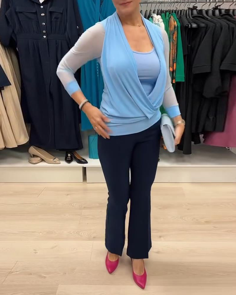 Camicetta trasparente con scollo incrociato