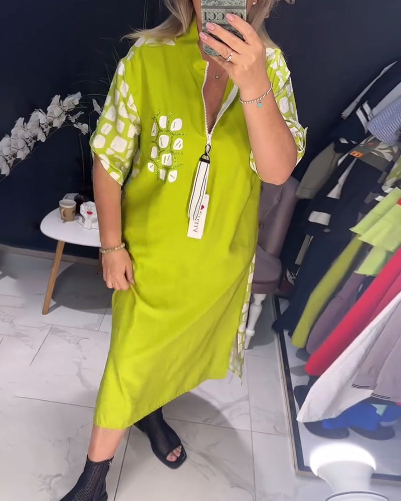 Kleid mit halbem Reißverschluss und unregelmäßigem Schlitz