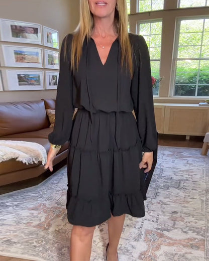 Abito a trapezio con maniche lunghe in tinta unita