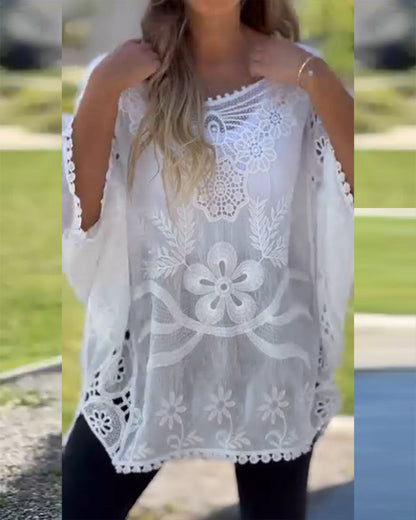 Bluse mit Spitzeneinsatz und Fledermausärmeln