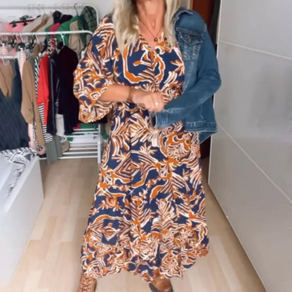 Vestido maxi estampado com decote em V