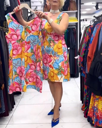 Ärmelloses Kleid mit V-Ausschnitt und geblümter Taille