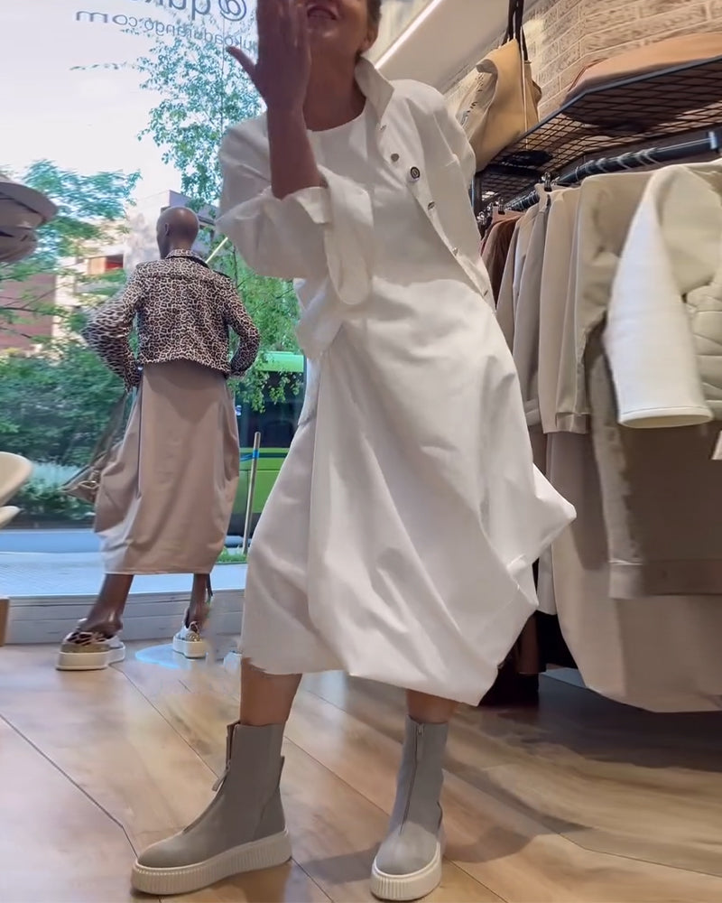 Einfarbiges, ärmelloses, lockeres Kleid