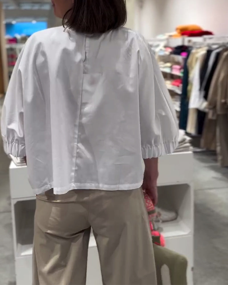 Lockere Bluse mit Fledermausärmeln in Volltonfarbe