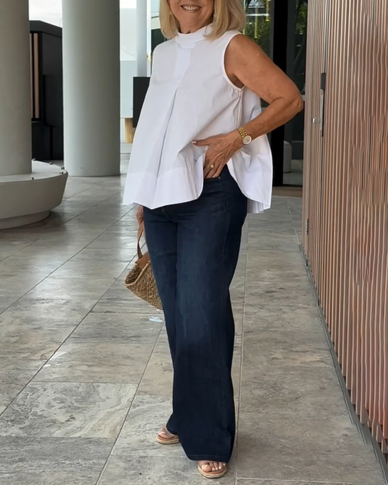 Blusa semplice senza maniche in tinta unita