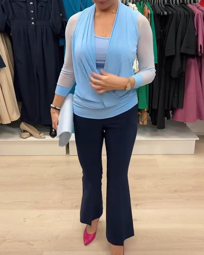 Camicetta trasparente con scollo incrociato