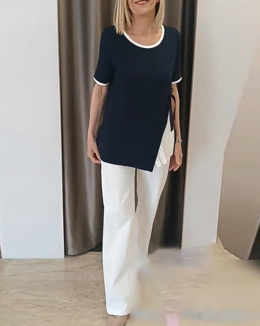 Blusa plissettata a contrasto con scollo rotondo