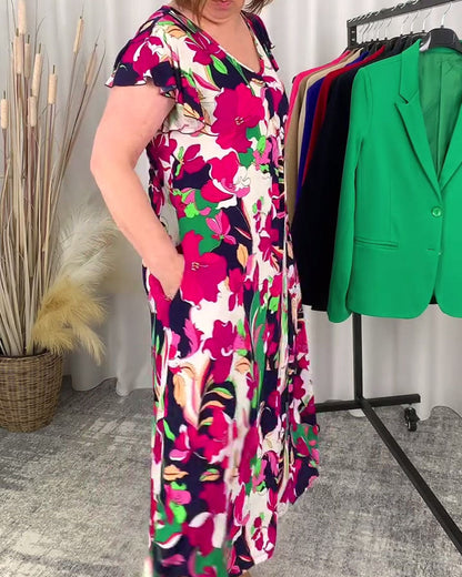 Kleid mit buntem Blumendruck und V-Ausschnitt