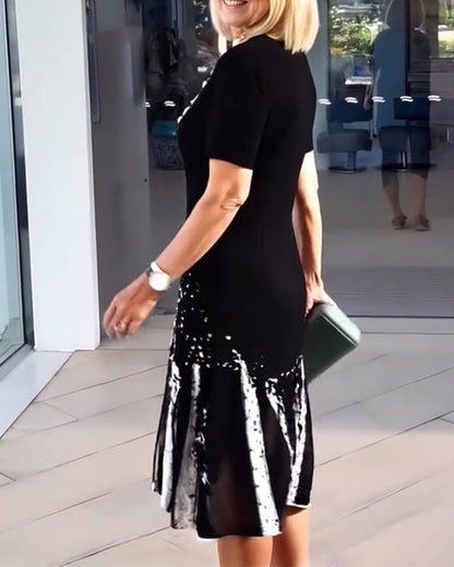 Temperamentvolles Kleid mit Pendler-Print