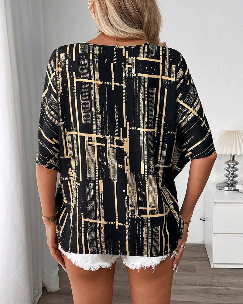 Camicetta stampata con scollo a V retrò e maniche a pipistrello