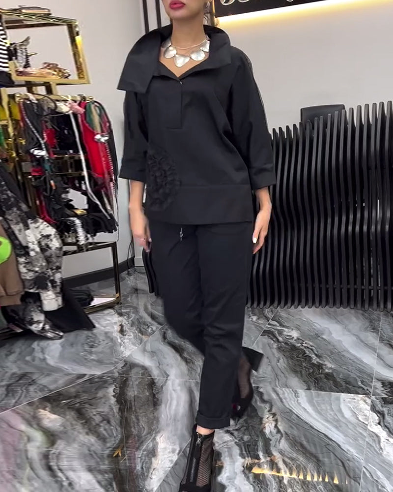 Bluse mit Blumenmuster und Spitzenbesatz am Revers