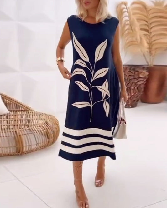 Elegantes ärmelloses Kleid mit Blattmuster