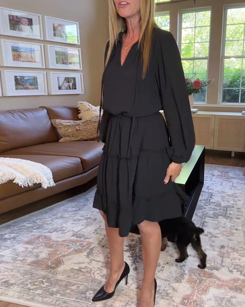 Abito a trapezio con maniche lunghe in tinta unita