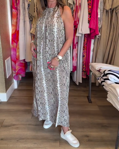 Elegante abito stampato senza maniche con scollo all'americana