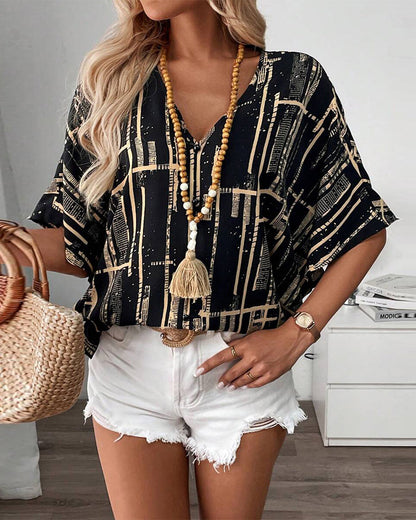 Camicetta stampata con scollo a V retrò e maniche a pipistrello