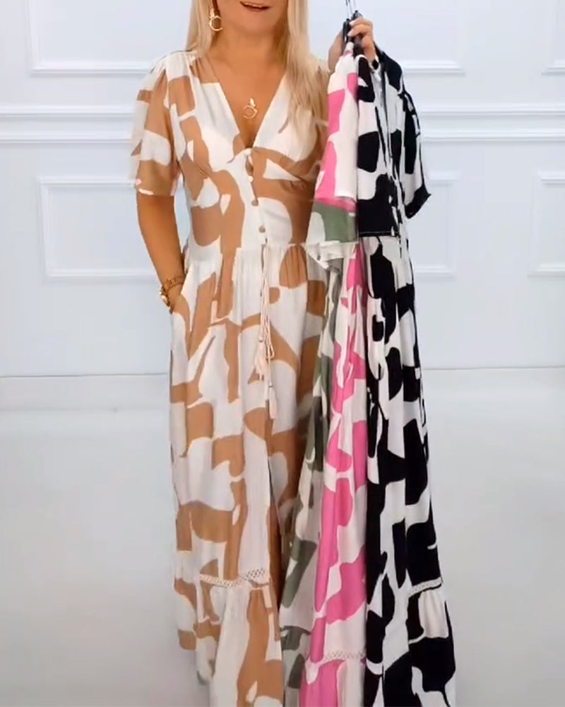 Festliches Kleid mit tiefem V-Ausschnitt und Print