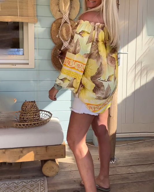 Blusa con stampa resort e spalle scoperte