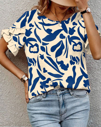 Blusa stampata con scollo tondo e volant