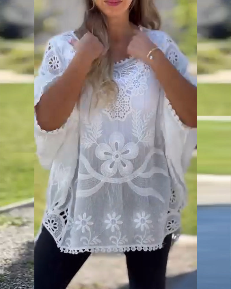 Bluse mit Spitzeneinsatz und Fledermausärmeln