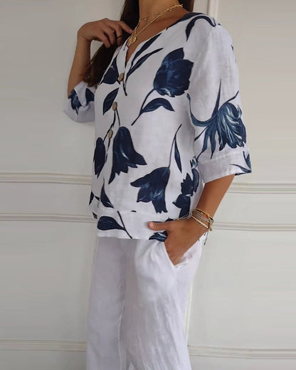 Top con bottoni in cotone e lino con stampa floreale