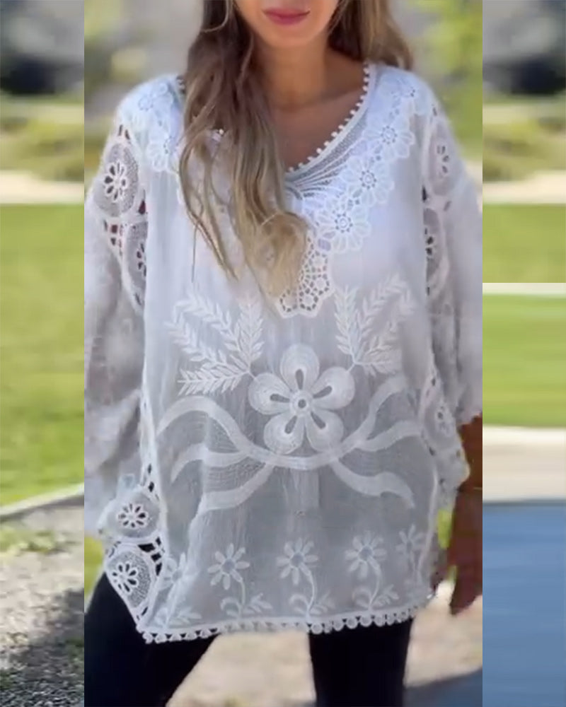 Bluse mit Spitzeneinsatz und Fledermausärmeln