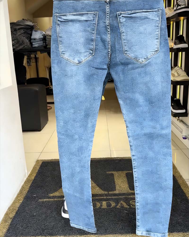 Distressed Slim-Fit Tapered Jeans