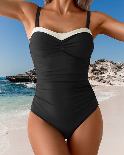 Einteiliger Badeanzug mit Strapsen in Kontrastfarbe