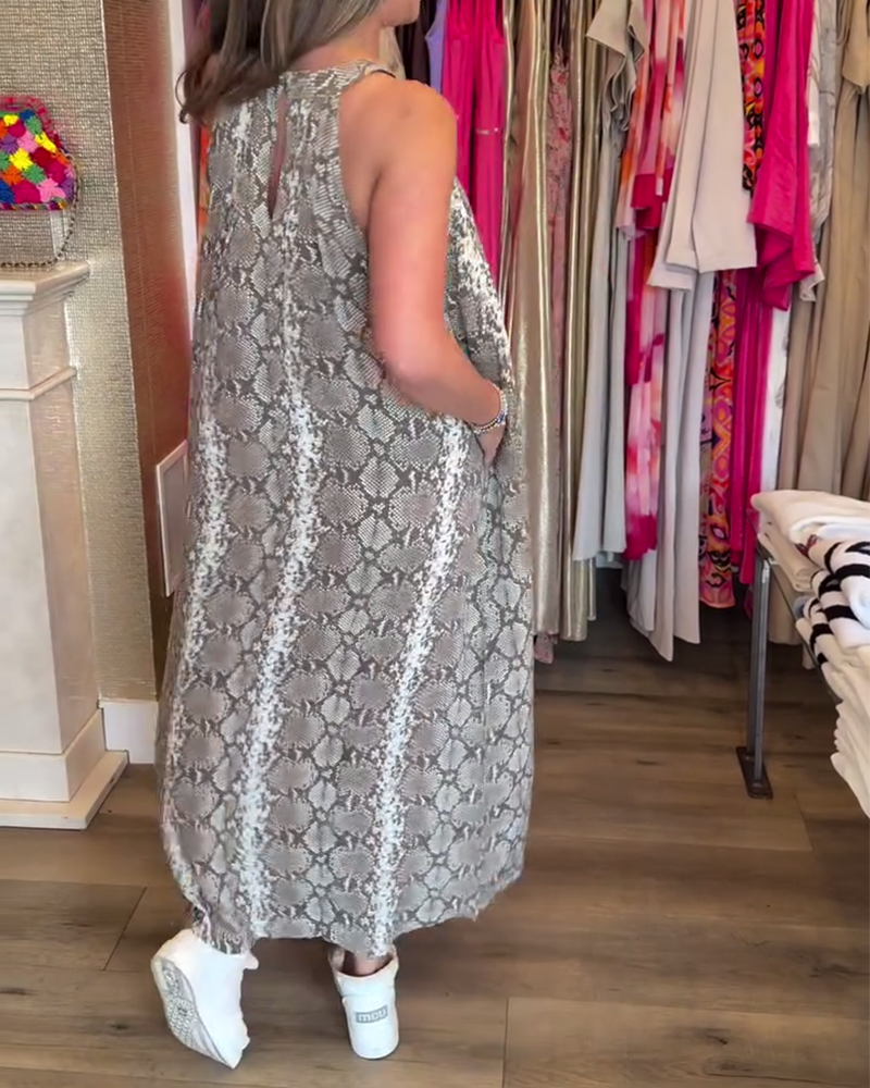 Elegante abito stampato senza maniche con scollo all'americana