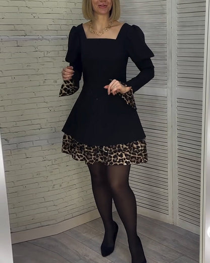 Elegantes Kleid mit Puffärmeln und Leopardenmuster