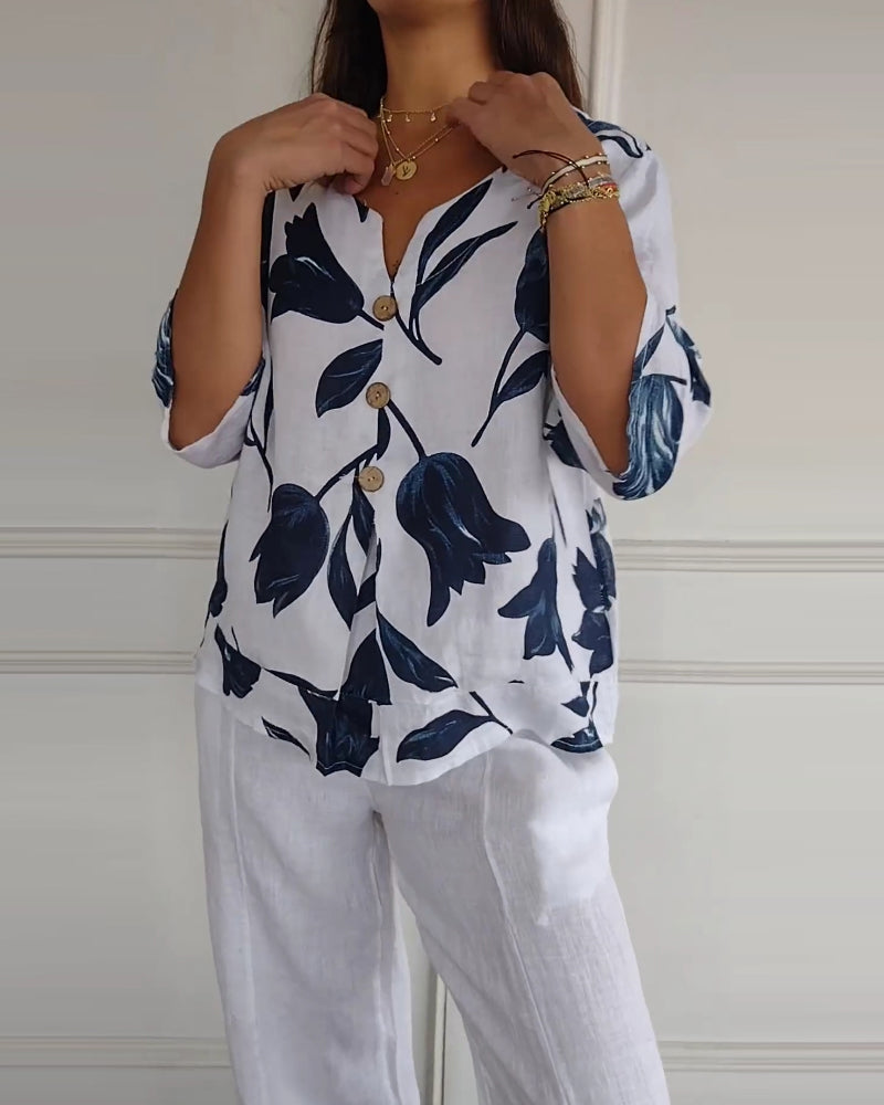 Top con bottoni in cotone e lino con stampa floreale