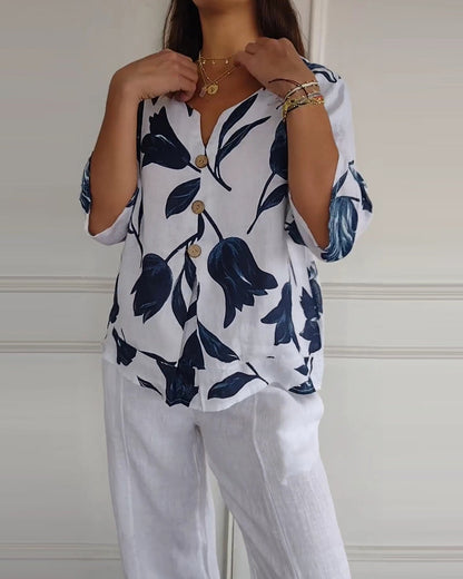 Top con bottoni in cotone e lino con stampa floreale