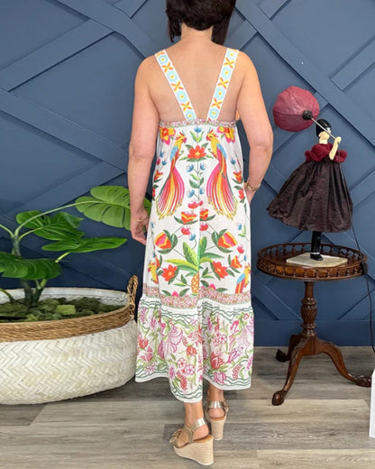 Abito con stampa floreale e scollo all'americana