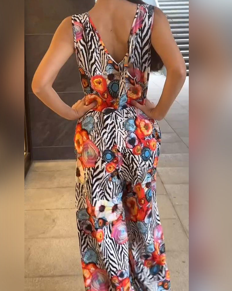 Tuta elegante senza maniche con stampa floreale