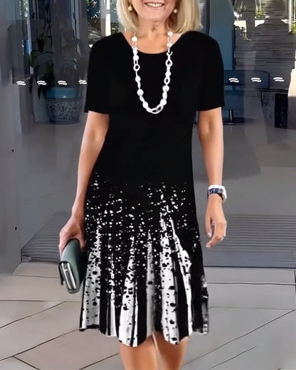 Temperamentvolles Kleid mit Pendler-Print