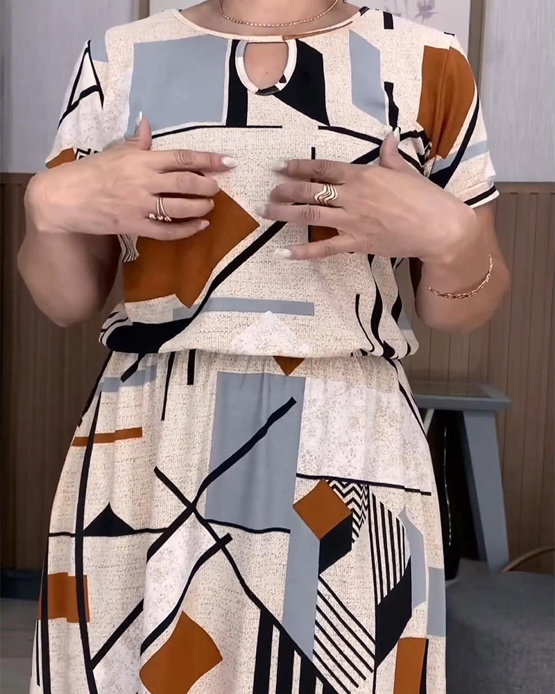 Kurzärmliges Kleid mit Blumenmuster und Rundhalsausschnitt