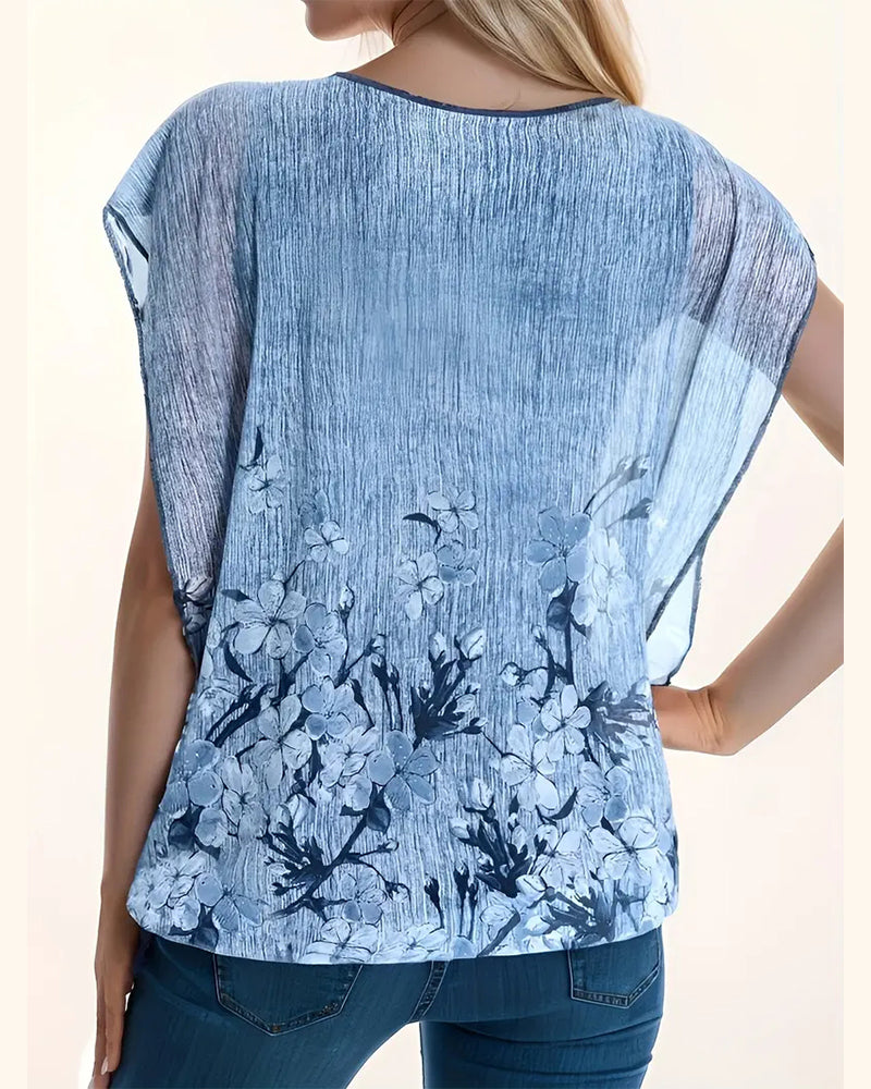 Modische Bluse mit floralen Fledermausärmeln