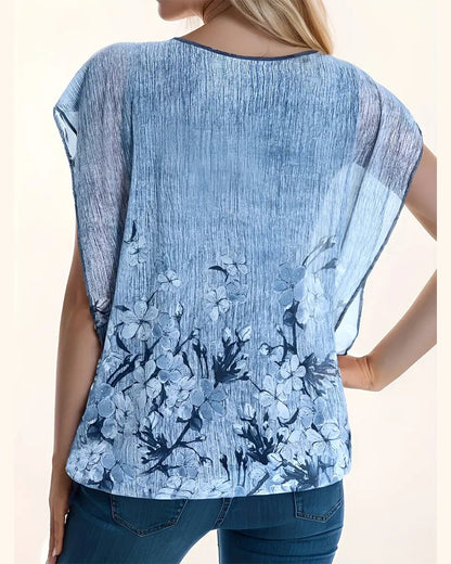 Modische Bluse mit floralen Fledermausärmeln