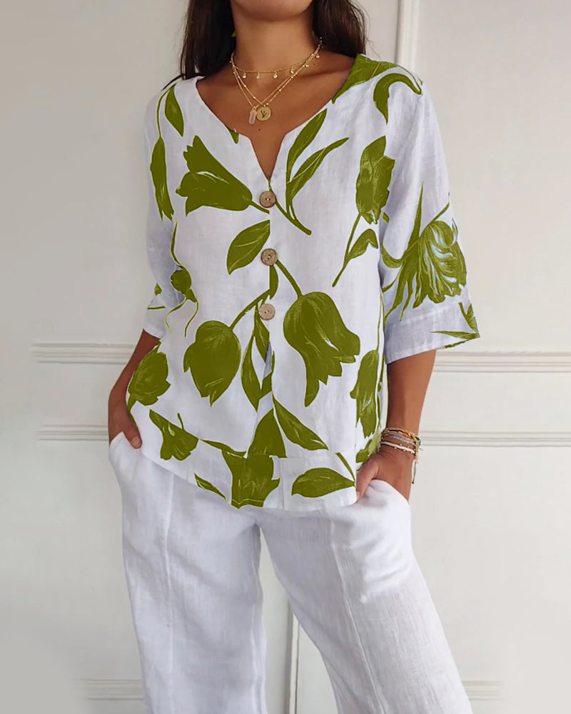 Top con bottoni in cotone e lino con stampa floreale