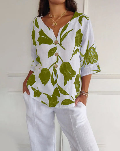 Top con bottoni in cotone e lino con stampa floreale