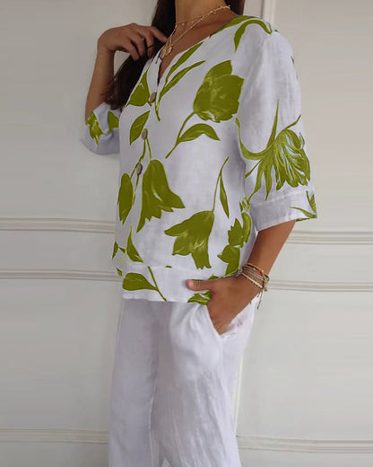 Top con bottoni in cotone e lino con stampa floreale