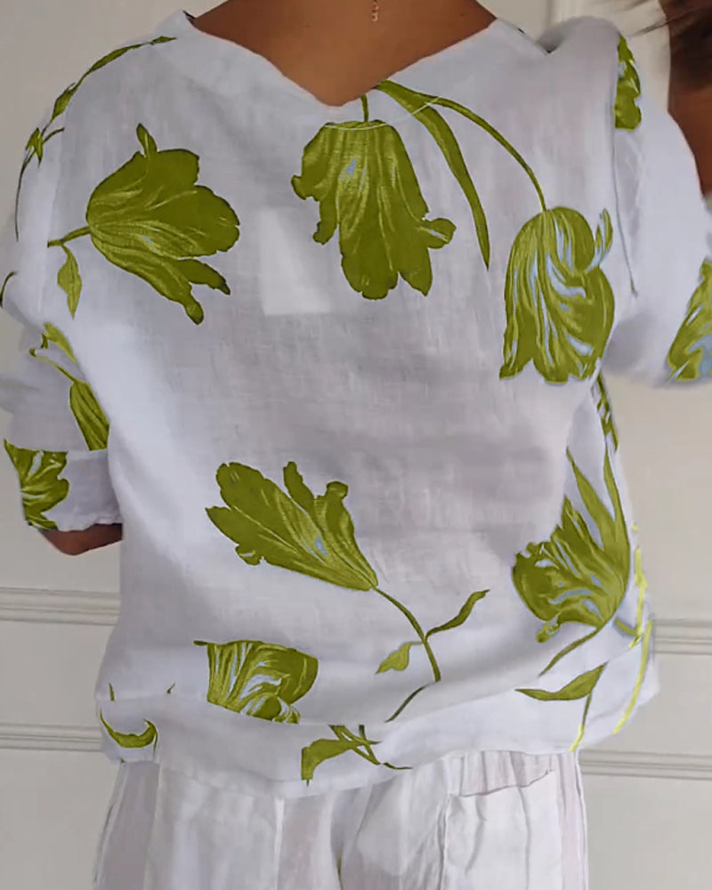 Top con bottoni in cotone e lino con stampa floreale