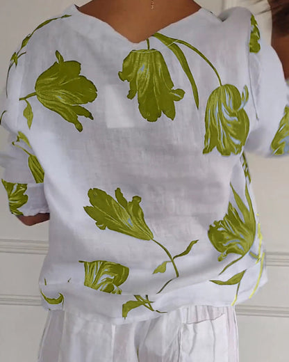 Top con bottoni in cotone e lino con stampa floreale