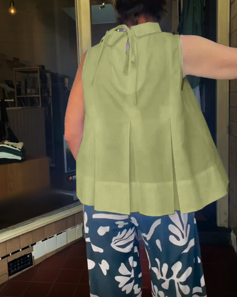 Blusa semplice senza maniche in tinta unita